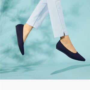 Vivaia navy pointed toe ballet flats